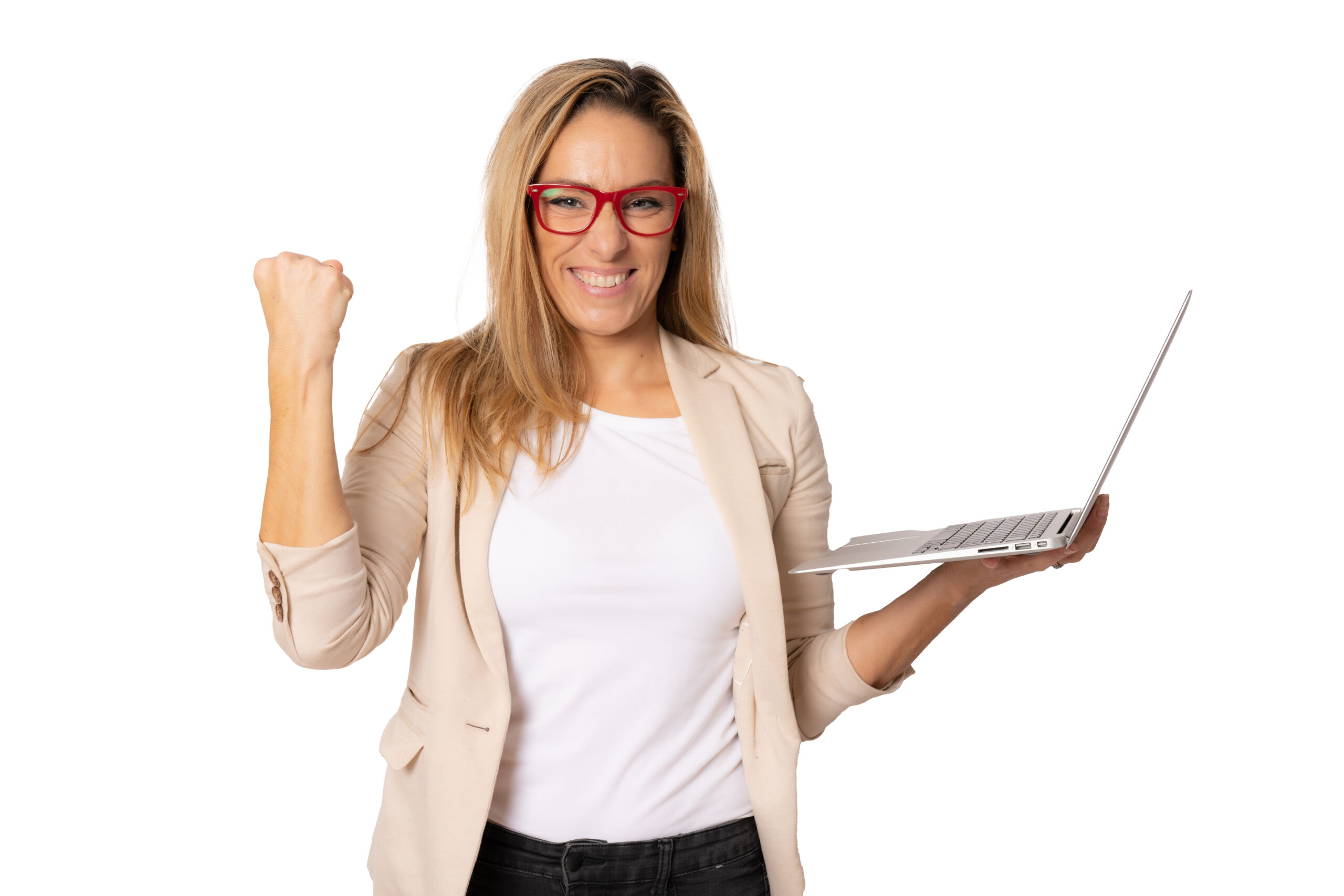 Portrait of a happy caucasian business woman working on laptop computer making victory sign isolated over white background